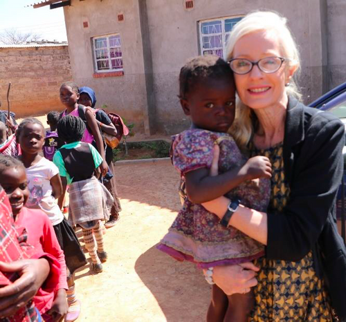 Teresa in Zimbabwe with a children's class.