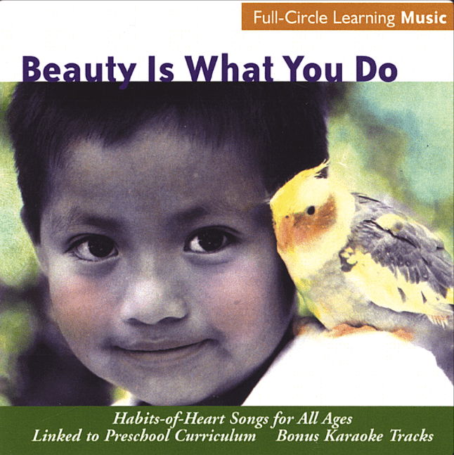A child smiles with a bird on their shoulder.