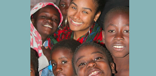 A group of kids around a light