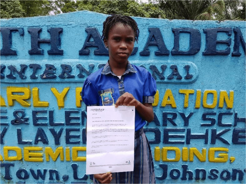 A student presents a paper.